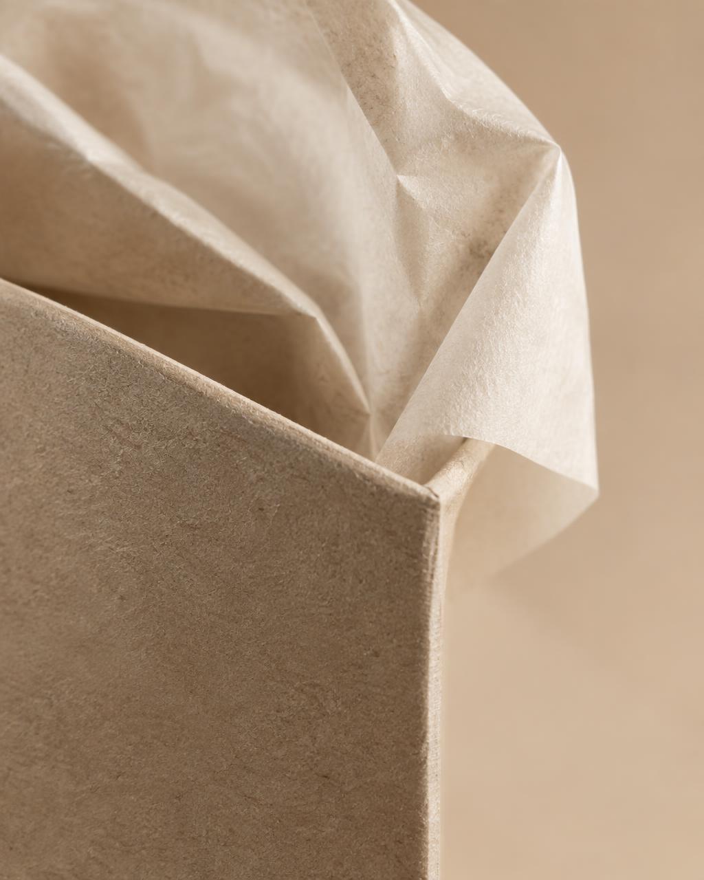 The uncoated board and tissue, close